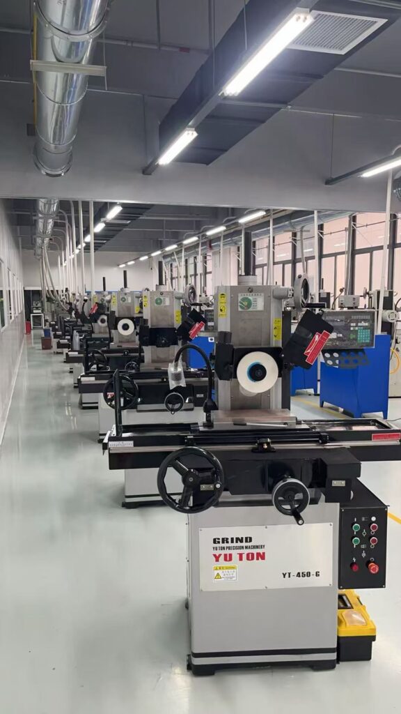 CNC grinding machine for batch production in industrial workshop