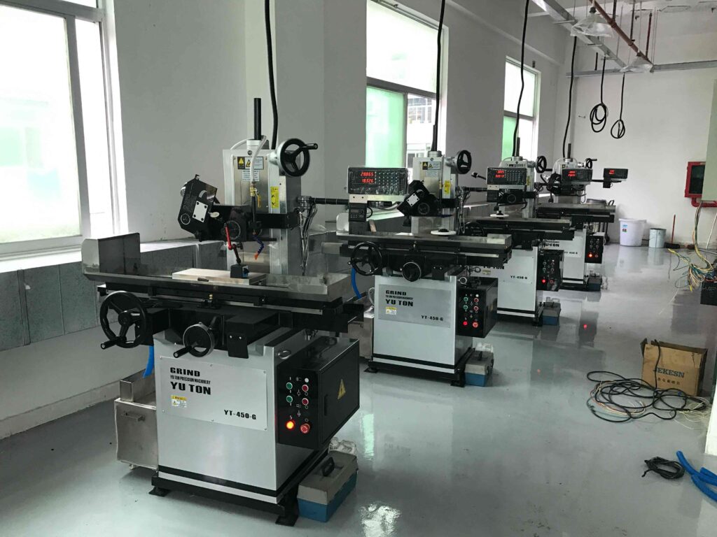 surface grinding machine for batch production in industrial factory