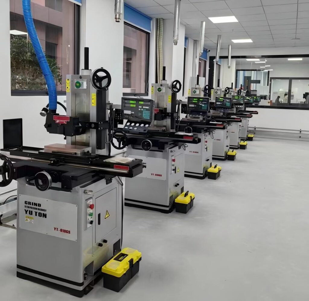 Row of YUTON manual channel grinding machines installed and commissioned at customer factory