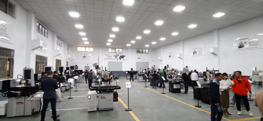 YUTON factory showroom with full range of PLC surface grinders
