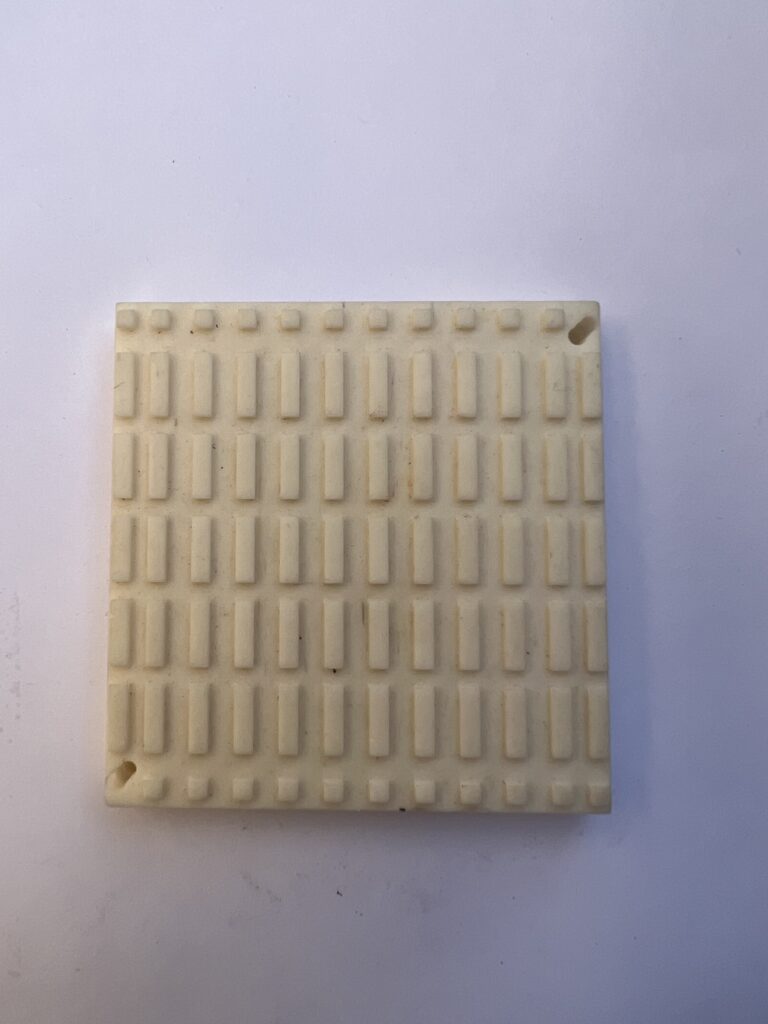 Precision ground ceramic surface finish with uniform grid pattern by CNC grinder