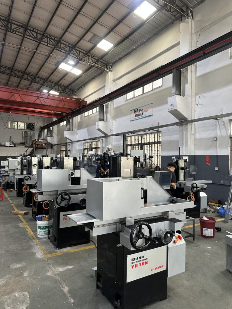 YUTON automated grinding machine processing metal parts in batch production
