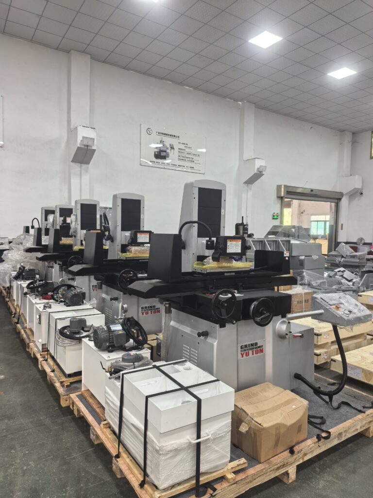 YUTON full-automatic CNC surface grinder with auto-loading system in action, demonstrating high-efficiency precision grinding for batch production workflows.