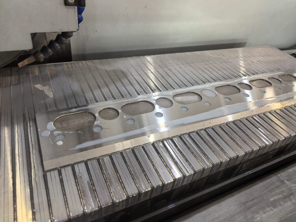Customer operating YUTON CNC precision grinder for high-volume part production