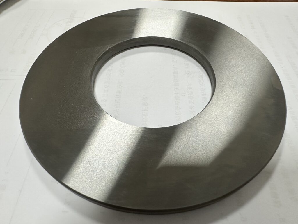 YUTON CNC surface grinder machining a precision round workpiece with Ra0.02μm surface finish and 0.001mm flatness accuracy