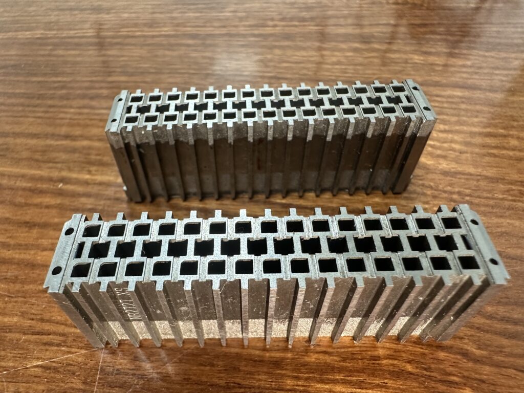 Precision ground metal component with mirror-like surface finish produced by YUTON grinder in Southeast Asia manufacturing facility.