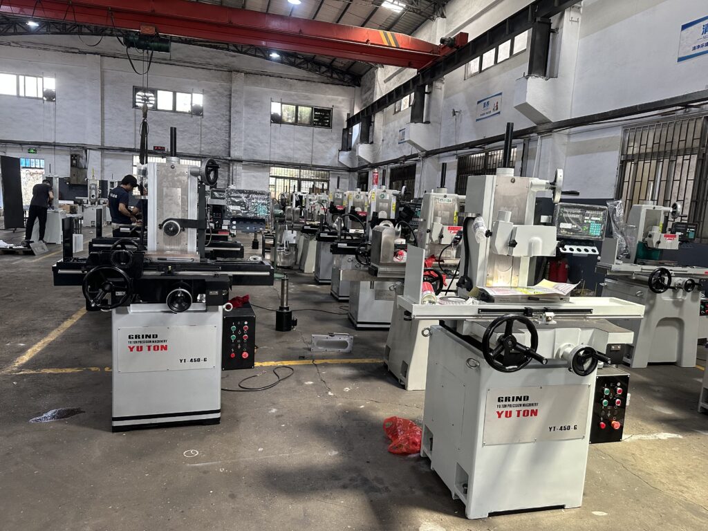 YUTON precision surface grinder units on production line at manufacturing facility