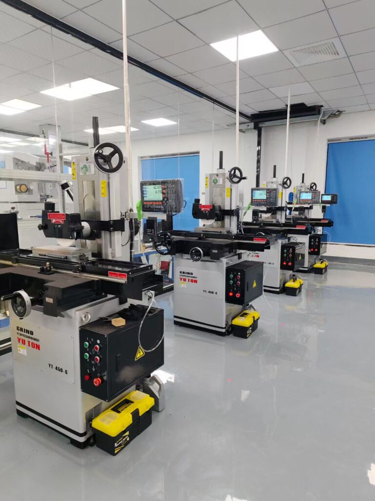 YUTON precision manual surface grinder installed at customer machine shop for precision part finishing