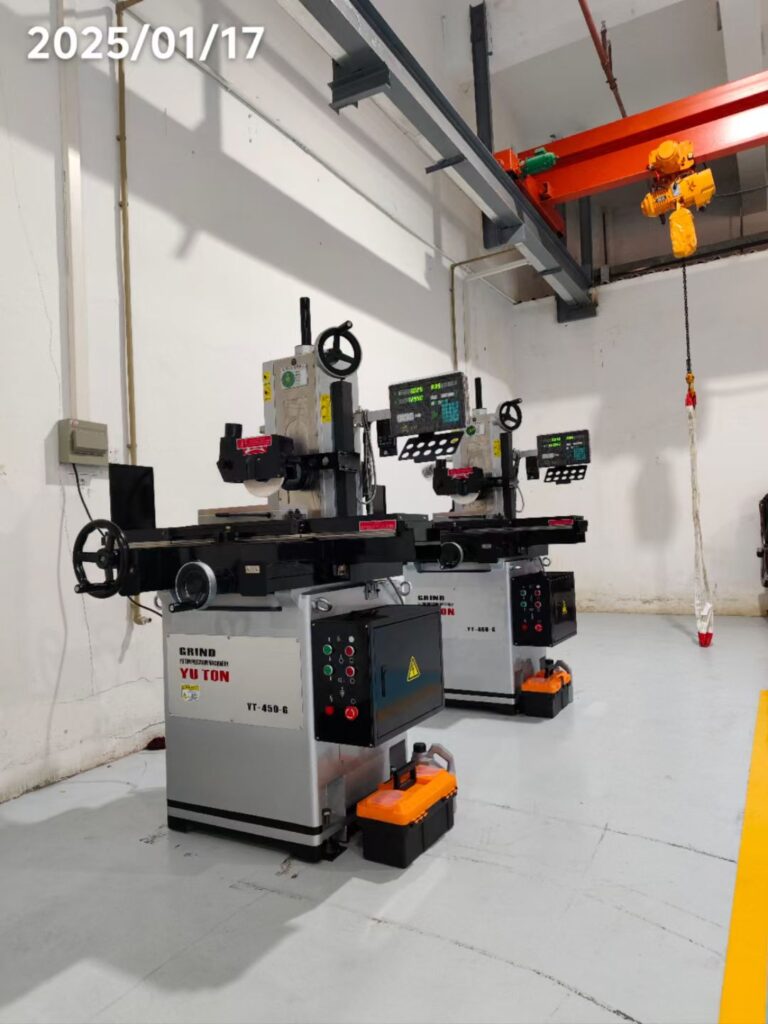 YUTON precision grinder featured in a modern Southeast Asian machine shop, serving as the hero image for the 2026 buyer's guide.