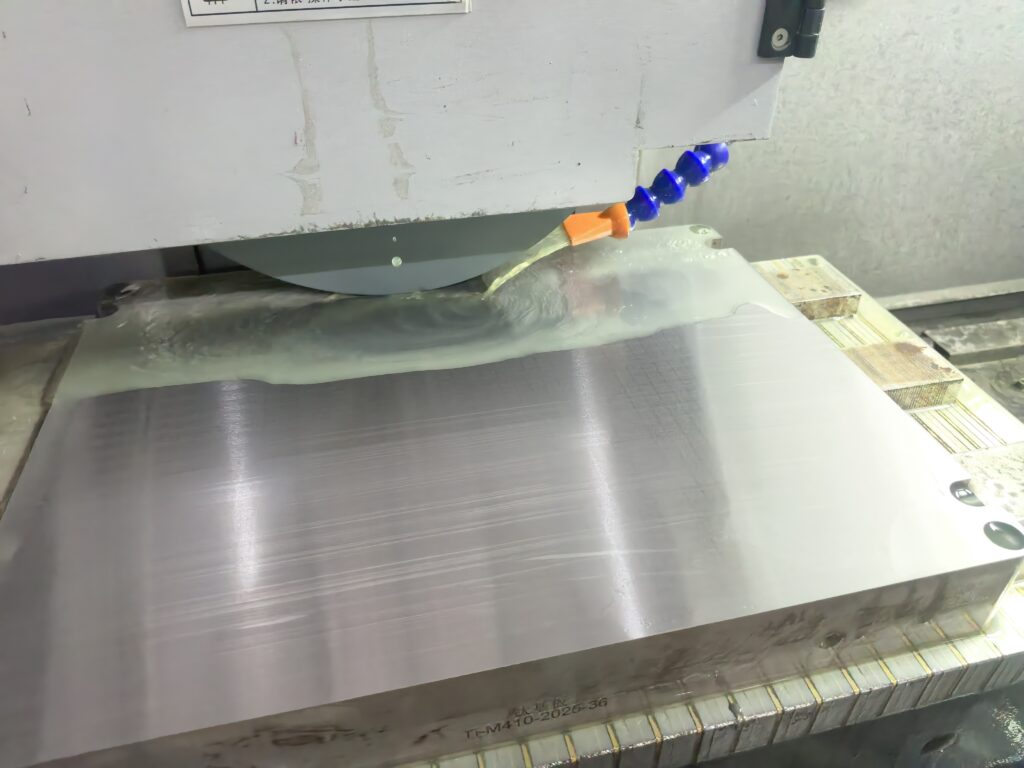 Surface grinding for stainless steel using a CNC surface grinder with coolant