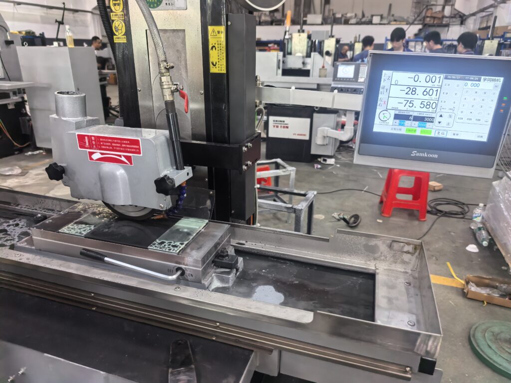 Smart manufacturing surface grinder displaying real-time production and machine status through IoT