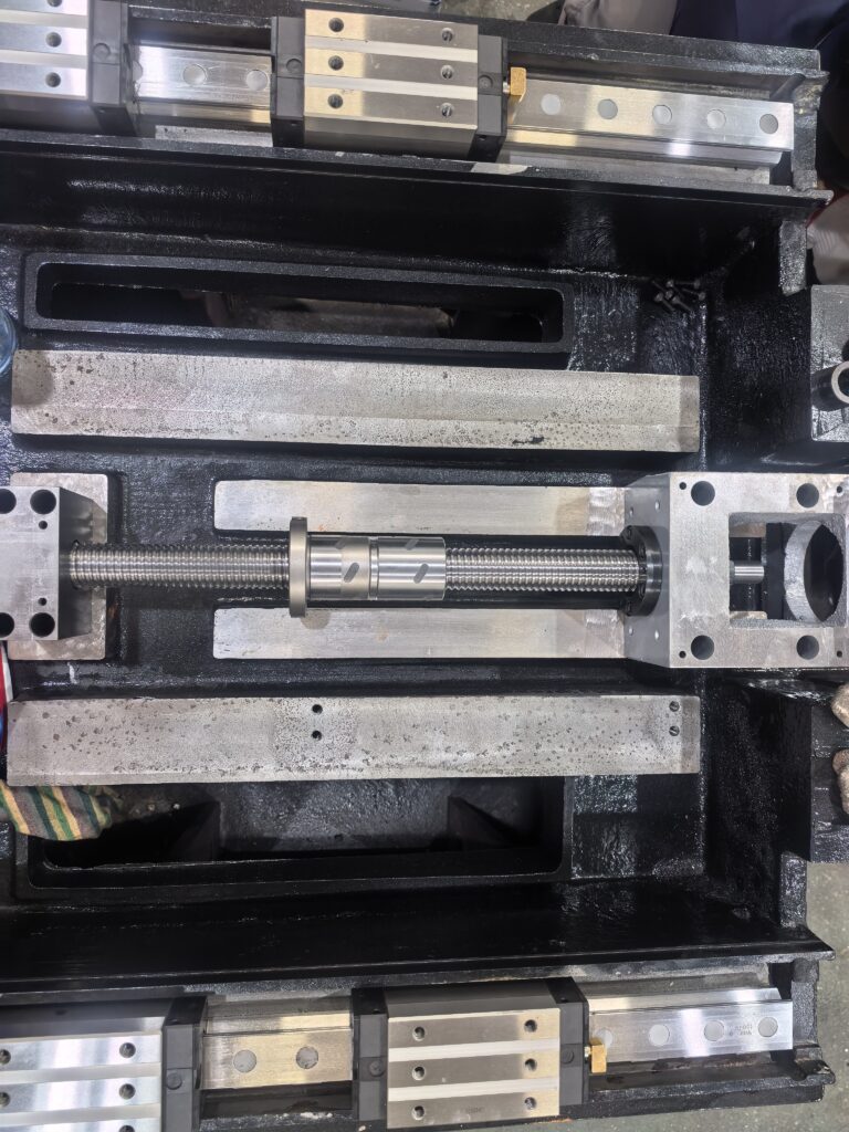 YUTON automatic surface grinder – screw and guide rail tuning by scraping & alignment in toolroom