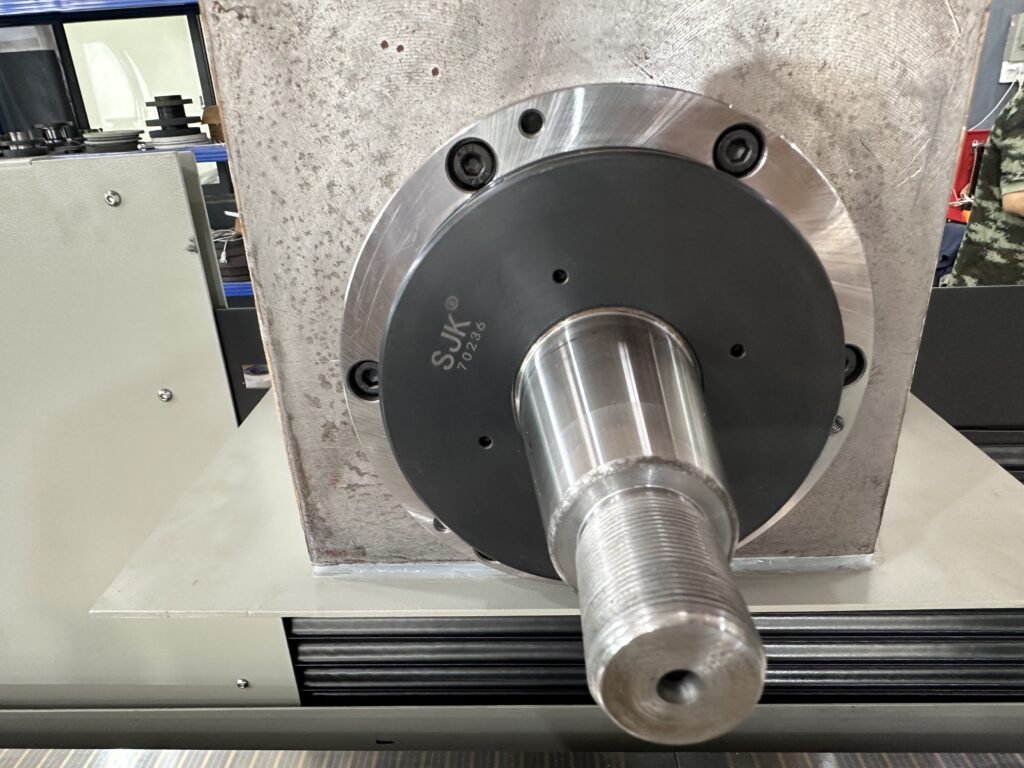 Surface grinder vibration troubleshooting using a dial indicator to inspect machine accuracy