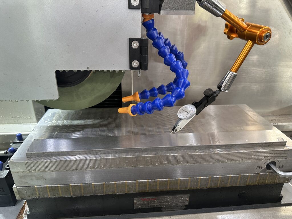 Quality inspection of precision ground tooling components produced with a surface grinder for toolroom