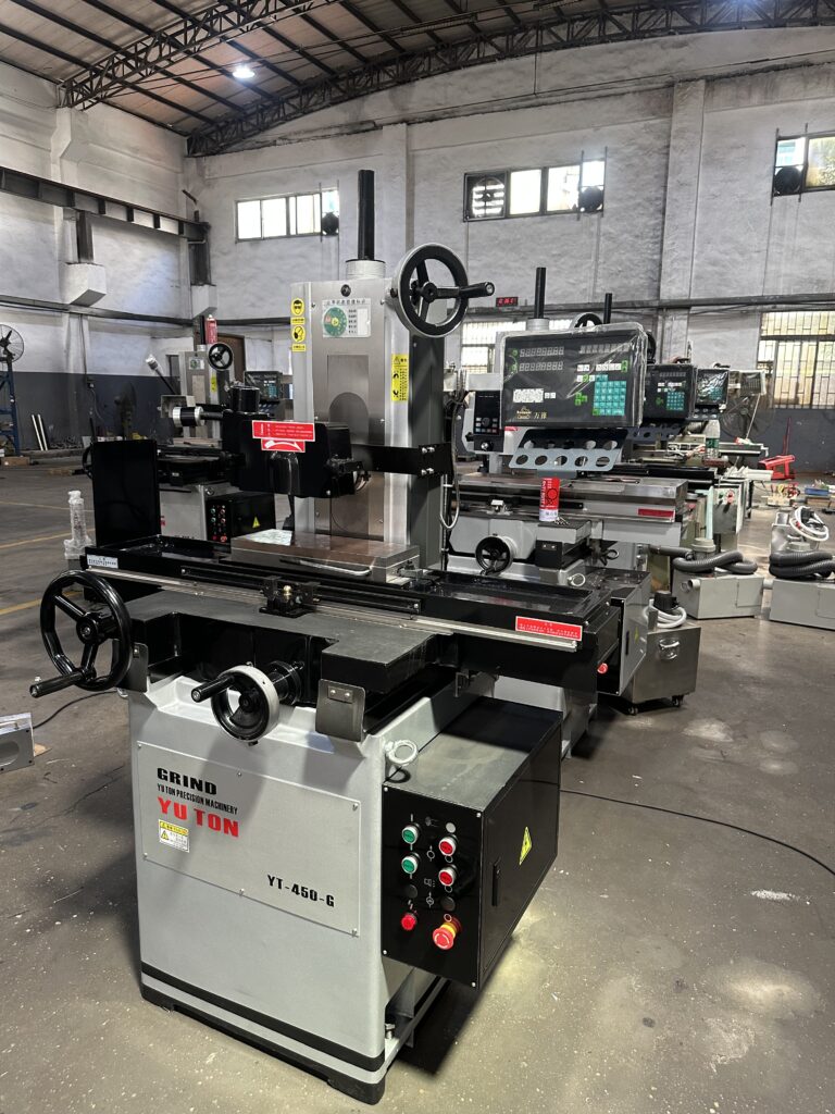 CNC vs manual surface grinder comparison featuring a manual surface grinder in a toolroom