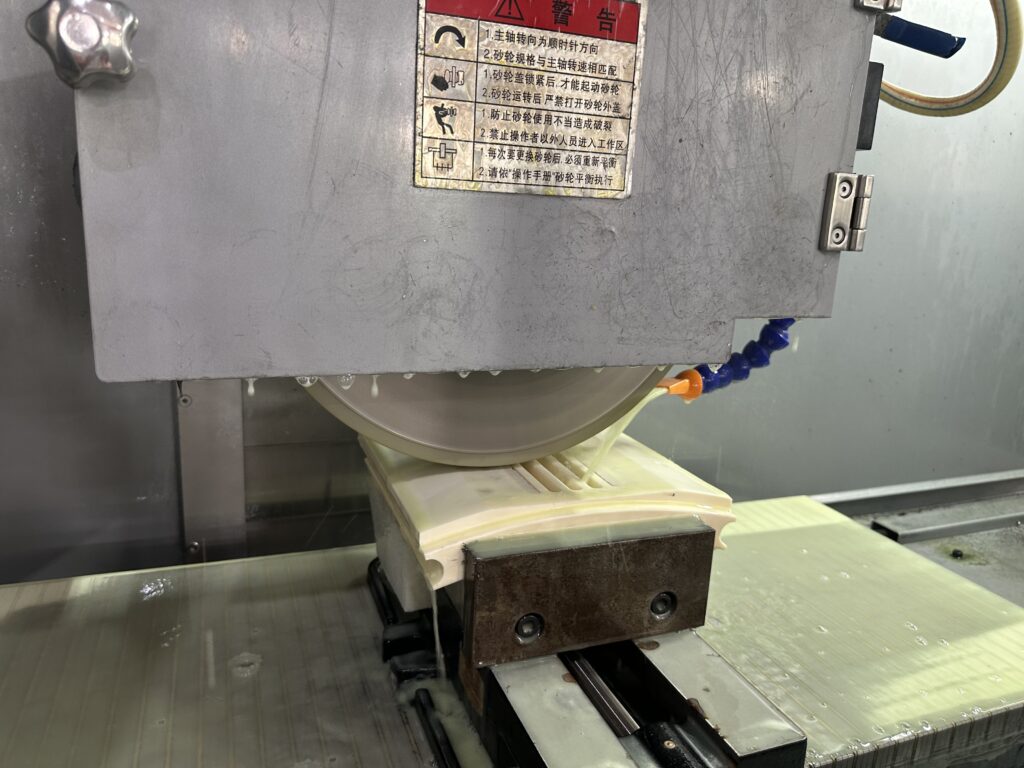 Diamond wheel grinding guide showing a diamond grinding wheel on a precision surface grinder