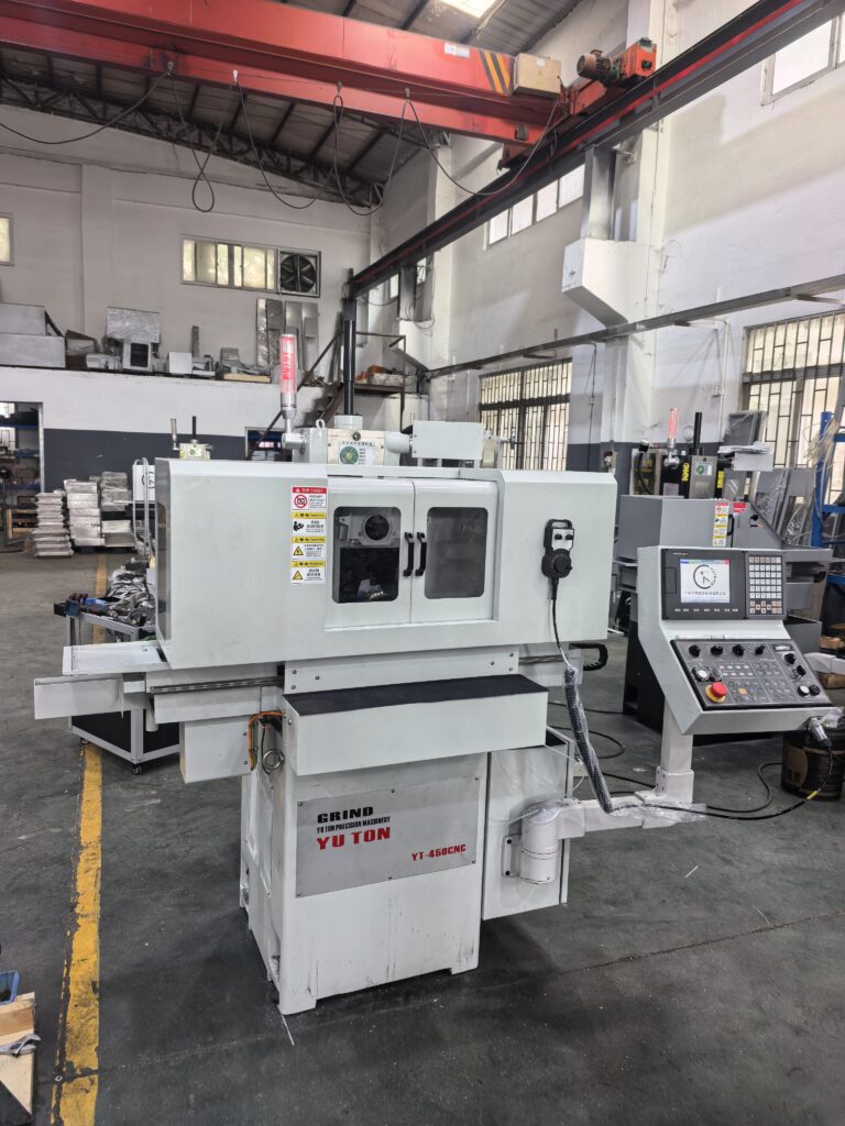 Hydraulic vs CNC surface grinder showing an automated CNC grinding machine