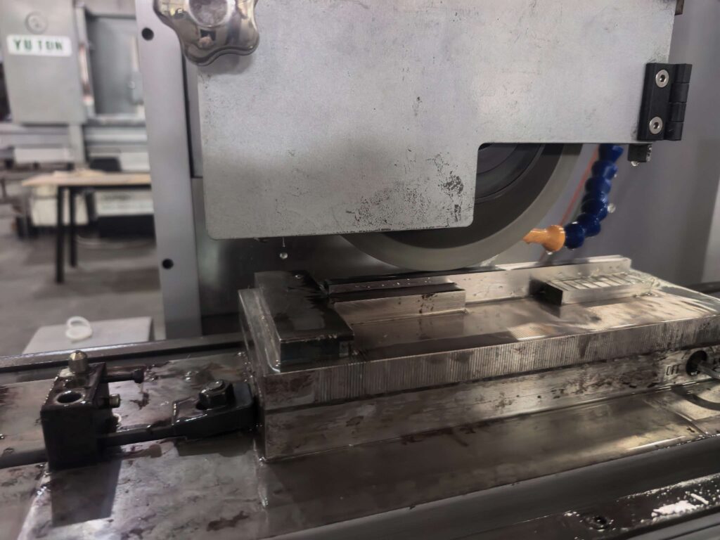 Surface grinding vs lapping process showing abrasive wheel and lapping plate operations