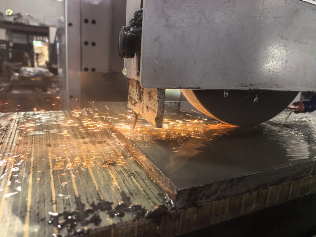 Surface grinding for aluminum showing wheel loading challenges during machining