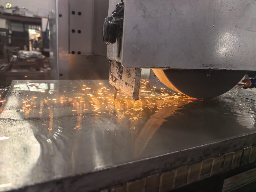Surface grinding for aluminum using a CNC surface grinder with coolant