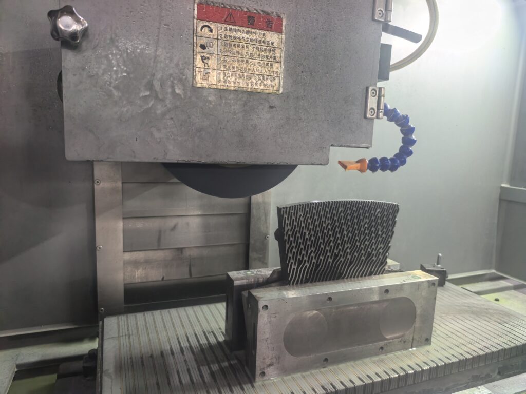 Four key surface grinding parameters including wheel speed feed rate depth of cut and crossfeed