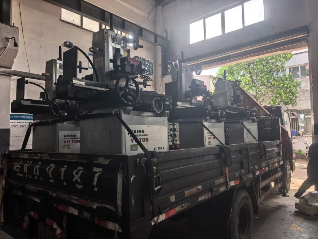 Hydraulic surface grinders loaded in a mixed export container