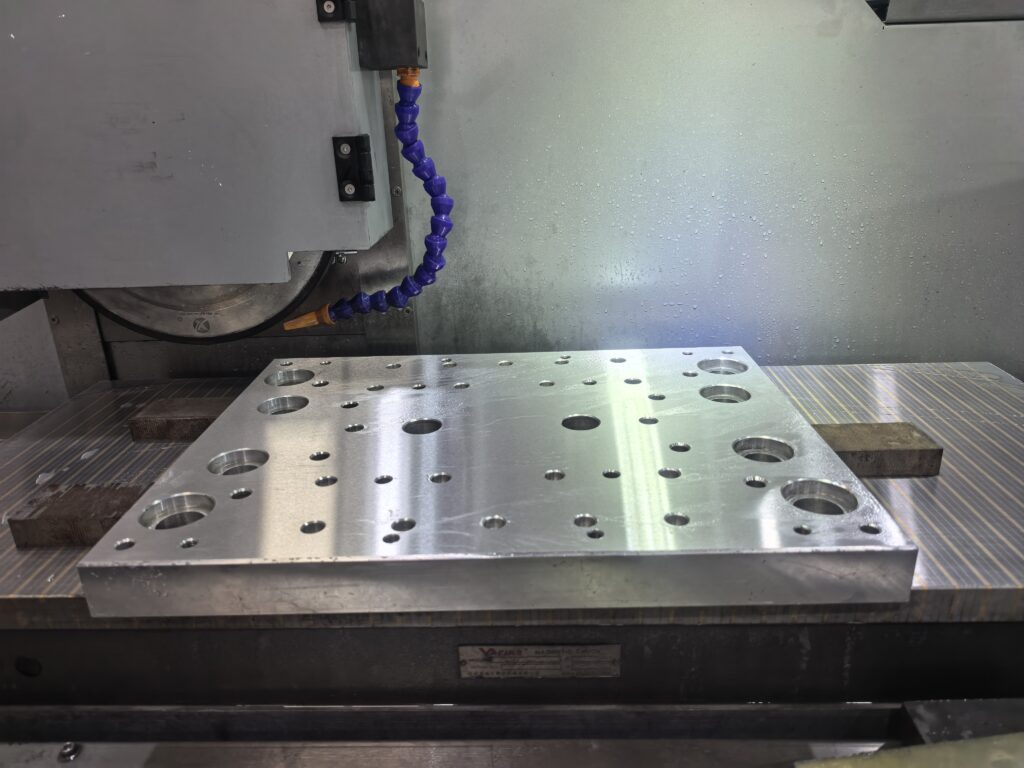 YUTON CNC grinder performing surface grinding for tungsten carbide components