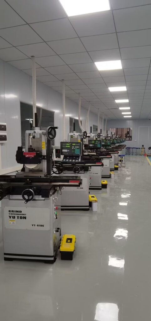 YUTON manual surface grinder in precision machining workshop