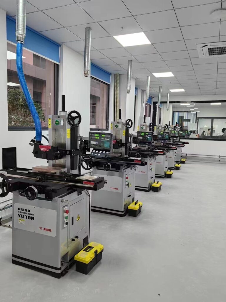Manual surface grinder wholesale machines in a factory showroom