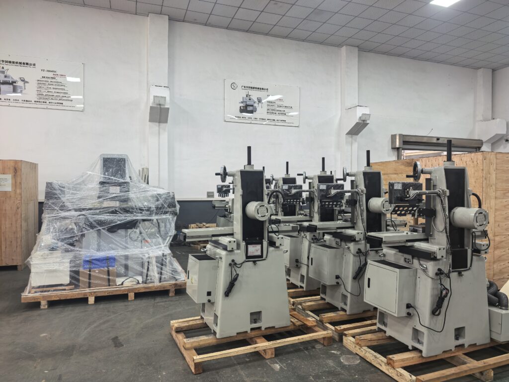 Manual surface grinder dealer machines in a factory showroom