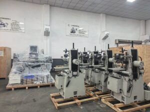 Manual surface grinder dealer machines in a factory showroom
